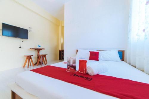 Giường trong phòng chung tại RedDoorz Premium @ Casa Ghilda Resort Olongapo City