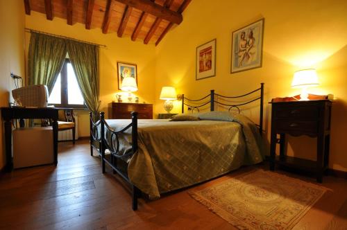 Postel nebo postele na pokoji v ubytování Casale De Santis