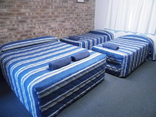 Nanango Fitzroy Motelにあるベッド