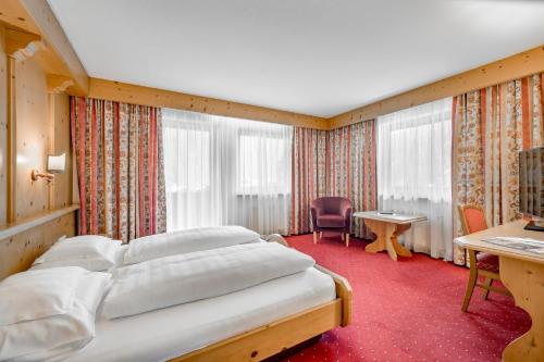 Hotel Almhofにあるベッド