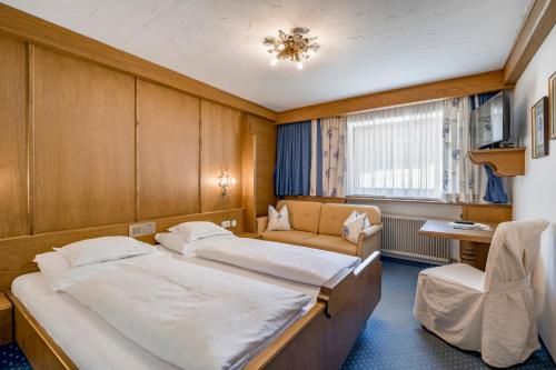 Hotel Almhofにあるベッド