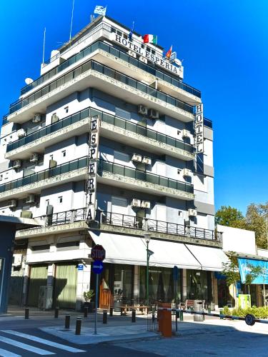 a large white building with a sign on it at ESPERIA Drama HOTEL in Drama