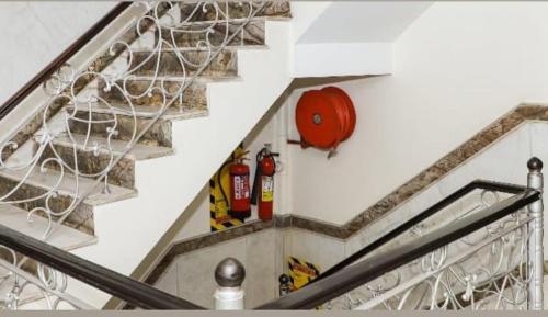 a staircase with a basketball and a ball in a net at Hotel Stay Well Dx in New Delhi