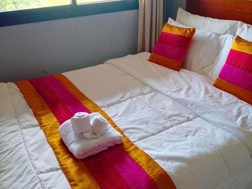 Postel nebo postele na pokoji v ubytování Puektian Seaview Family Suite