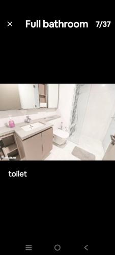 a bathroom with a sink and a toilet at Eaton kl,1R1B,0 Servies,500 mbps,klcc,2 pax in Kuala Lumpur