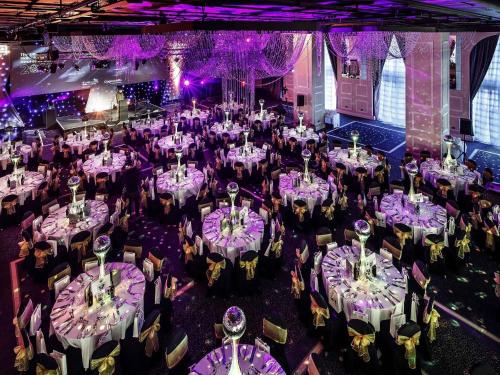 an overhead view of a banquet hall filled with tables at Mercure Manchester Piccadilly Hotel in Manchester