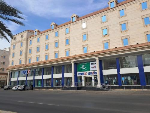a large building with a target building at فندق اعلي الثناء - Max Praise Hotel in Yanbu