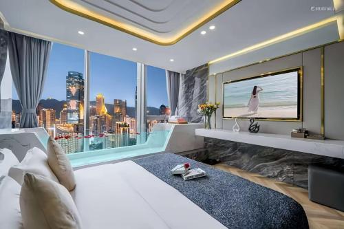 a bedroom with a large bed and a large window at Yunmulijin Sky High Riverview Hotel Chongqing Jiefangbei Raffles Plaza in Chongqing