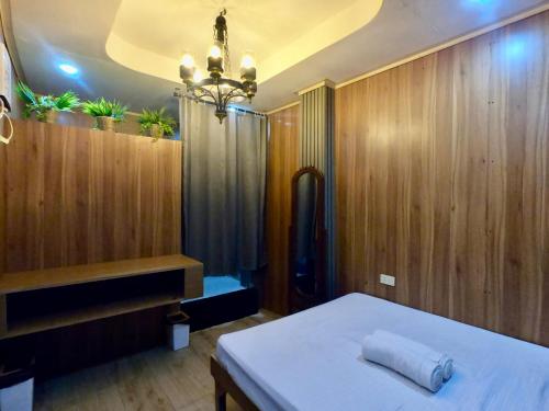 Ένα ή περισσότερα κρεβάτια σε δωμάτιο στο Ilali Budget Accommodation