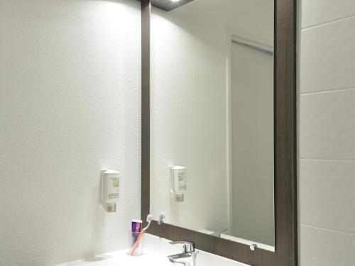 Koupelna v ubytování Aparthotel Adagio Access Toulouse St Cyprien