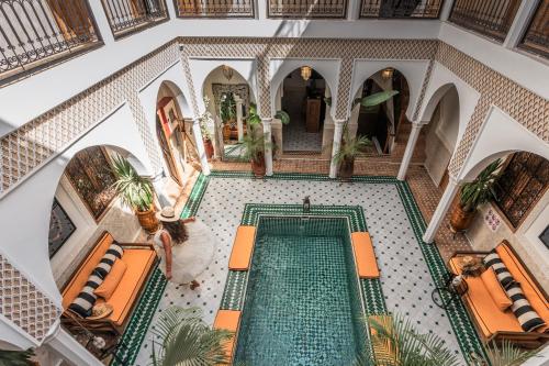 an overhead view of a swimming pool in a villa at Riad NL&S Collection in Marrakech