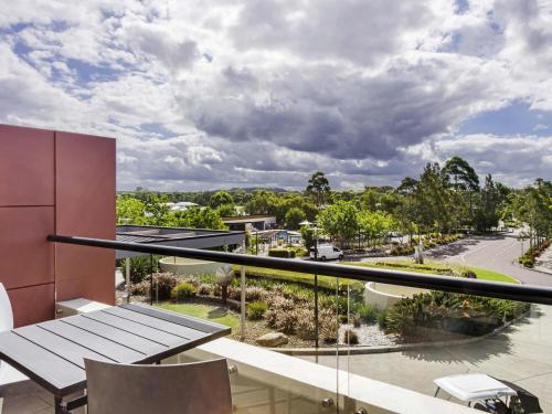a view from the balcony of a house at Mercure Kooindah Waters Central Coast in Wyong