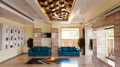 Zona de estar de ASR Parklane, A Bergamont Hotel - Hosur