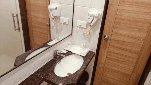 Un baño de ASR Parklane, A Bergamont Hotel - Hosur