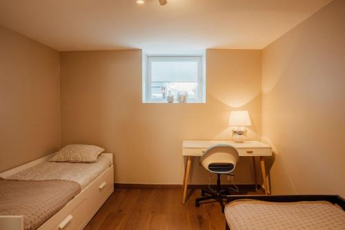 Giường trong phòng chung tại Porsgrunn City Apartments