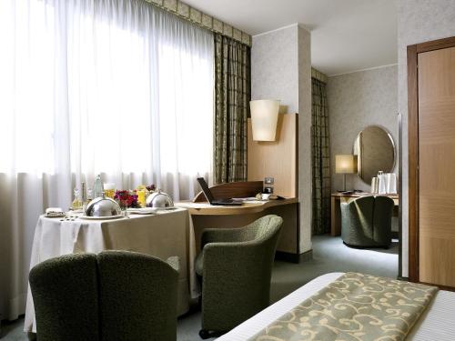 Χώρος καθιστικού στο Mercure Roma West