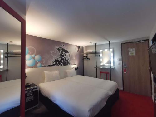 Katil atau katil-katil dalam bilik di Ibis Styles Paris Saint Denis La Plaine