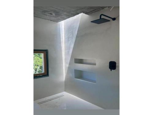 Un baño de Seafront House in Vathi, Methana
