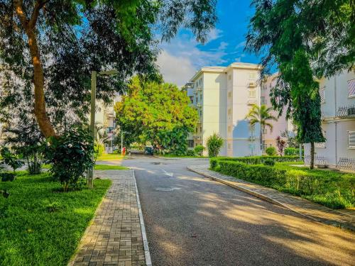 an empty street in a city with buildings at Remarkable 5-Bed Apartment in Kilamba - Luanda in Luanda