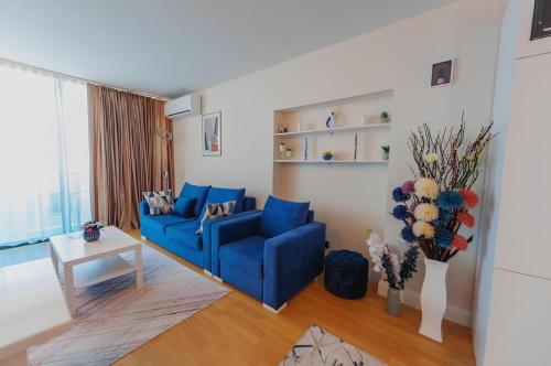 Гостиная зона в Orbi city luxury Towers