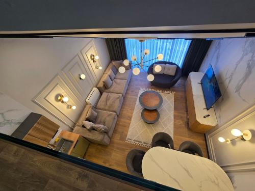 an overhead view of a living room with a couch at Apartments Lura in Peje