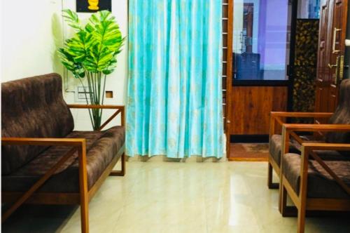 Χώρος καθιστικού στο Aps inn munnar
