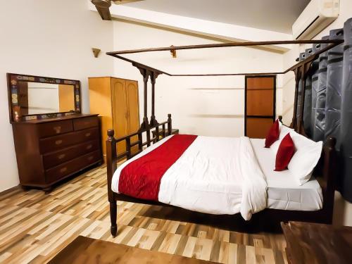 Katil atau katil-katil dalam bilik di The Plix Villa, Vagator
