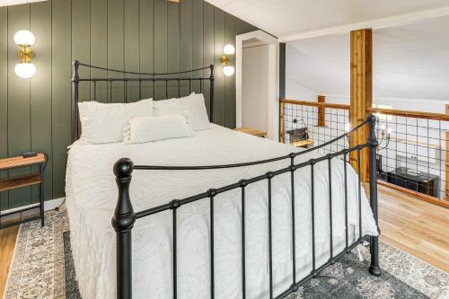 a bedroom with a large bed in a room at Luxe Stable Suite Farm Stay in Lebanon! in Lebanon