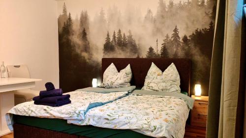 a bedroom with a bed with a painting on the wall at Privater Luxus am Untersberg in Grödig