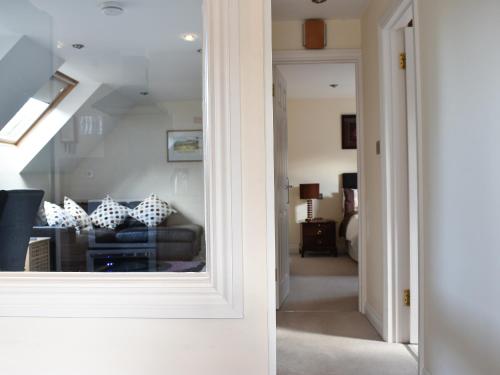 a view of a living room with a couch at The Dell in Minehead