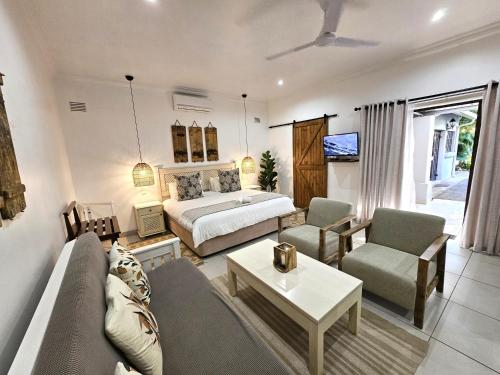 Χώρος καθιστικού στο Leopard Tree Lodge