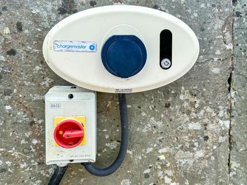 a gas meter sitting on the ground next to at Wild Rose in Delabole