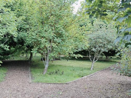 a park with trees and grass and a path at Crossgates - 9562 in Grantley