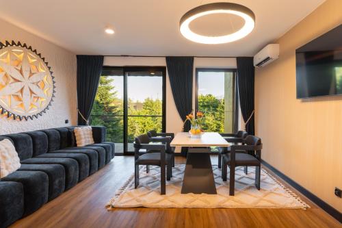 TV a/nebo společenská místnost v ubytování Góralski Resort 2 z Basenem
