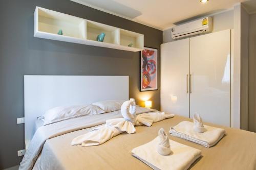 Ένα ή περισσότερα κρεβάτια σε δωμάτιο στο Modern Condo - 1BR T1-201