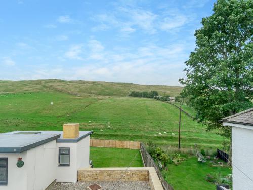 a view of a field from a house at Vallum Villa - Uk40231 in Bardon Mill