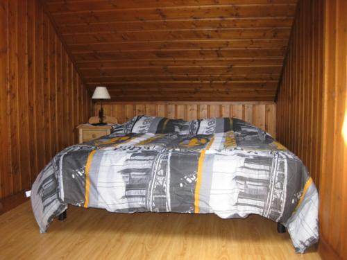 Katil atau katil-katil dalam bilik di Appartement Léa