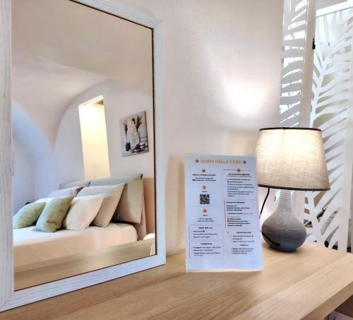 Belvedere & Relax, 1Bdr Apt, 1 Sofa Bed, 3 pp, Sea View, Wi-Fi e ACにあるベッド