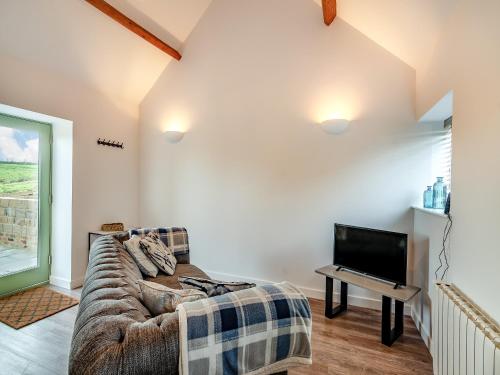 TV a/nebo společenská místnost v ubytování Cart Shed - Uk41245