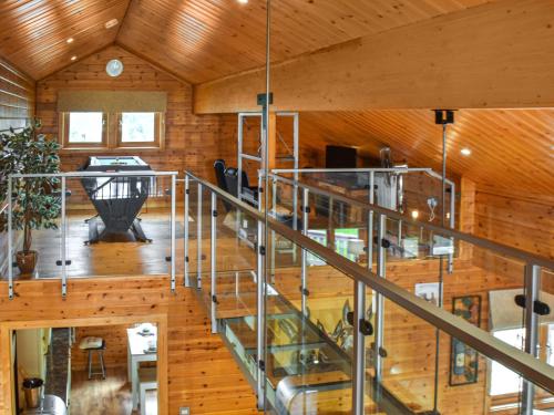 an overhead view of an office building with a spiral staircase at Wild Grape Lodge in Fritton Norfolk