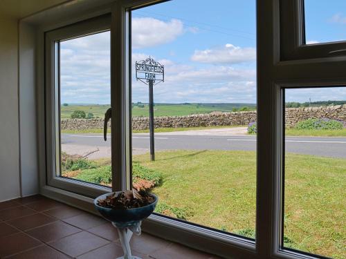 a window with a view of a street at Fellbeck -9565 in Grantley
