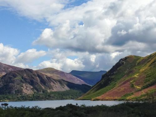 a view of a mountain range with a lake at Coast To Coast Cottage in Cleator Moor