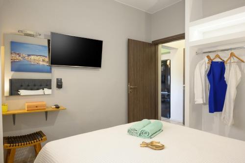 Postel nebo postele na pokoji v ubytování Dioni Lux