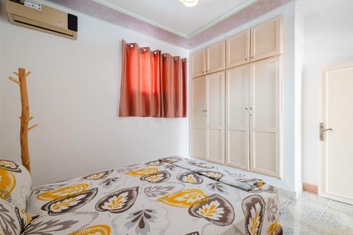 Ένα ή περισσότερα κρεβάτια σε δωμάτιο στο Aéroport hostel et chambre appartement studio Marrakech