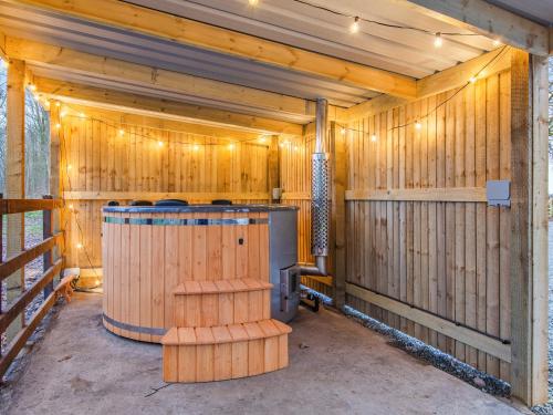 an inside view of a wooden cabin with a bar at South Lodge in Great Driffield