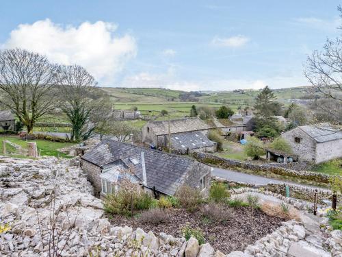 an aerial view of a village with buildings at Limecroft in Malham