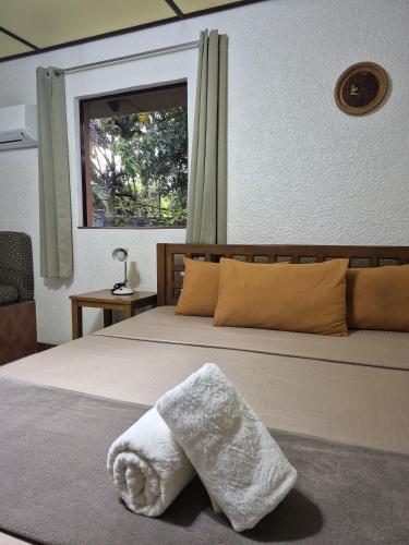 Postel nebo postele na pokoji v ubytování ALONALAND RESORT