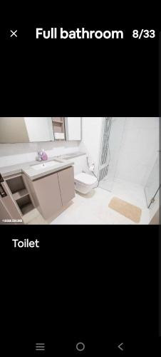 a picture of a bathroom with a sink and a toilet at Eaton KL,1R1B,0 Service,300mbps,KLCC,2 pax in Kuala Lumpur