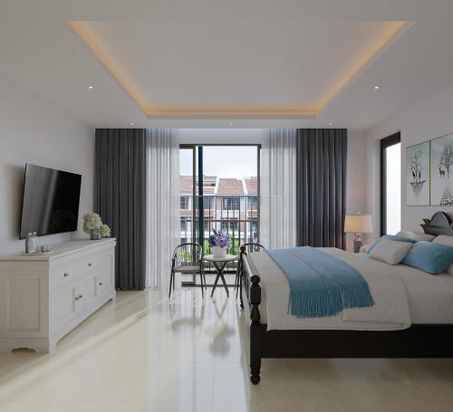 a white bedroom with a large bed and a television at Luna Oriental in Phú Quốc