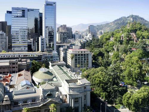 an aerial view of a city with buildings at Mercure Santiago Centro in Santiago